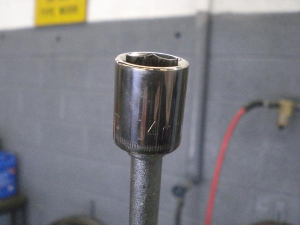 14 mm socket to remove the drain plug on the trans. oil pan.