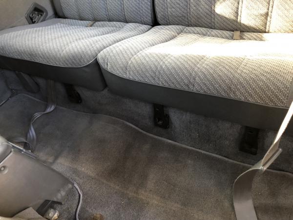 1988 Grey clean backseats.  Original carpet protected by heavy duty rubber matt