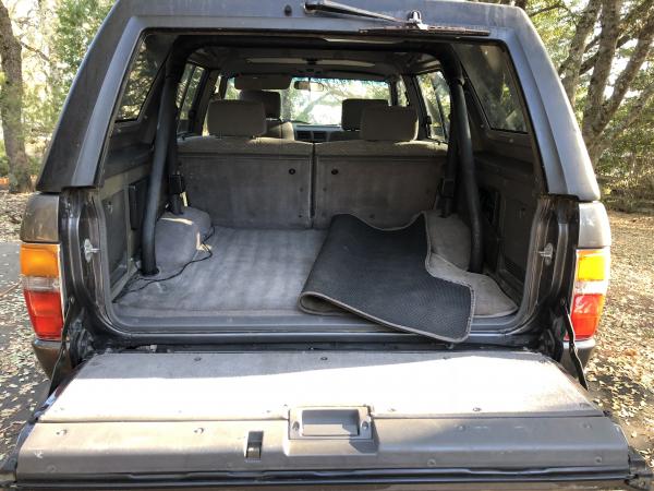 1988 Grey, original bed carpet protected by heavy duty rubber matt