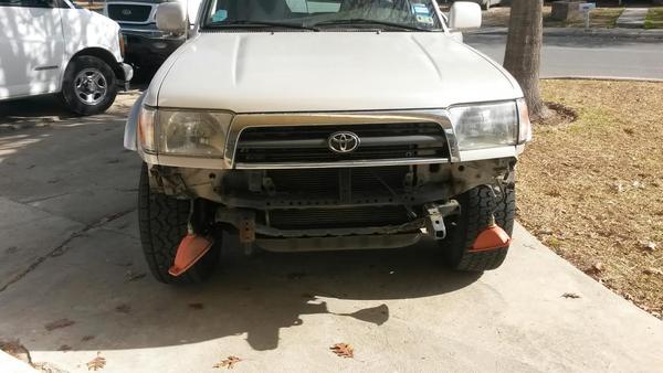 1997 4runner. Quick nose job to replace bumper brackets to straighten out the bumper and put new lower valance on.
