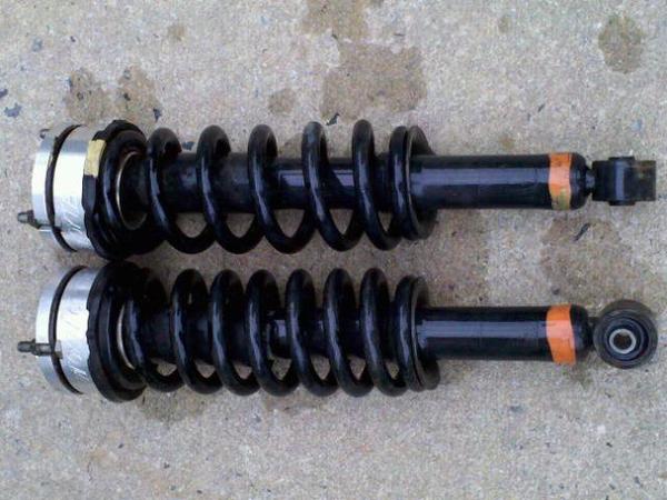 1999 coils with 3' toytec spacers!!! (Got these to level the rig out with the 7 rap LC`s in the back!)