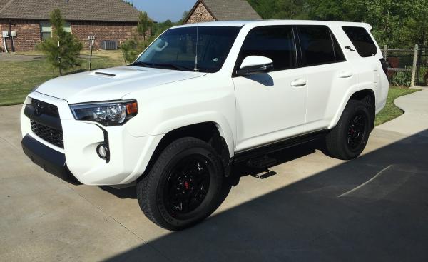 1st month changes:  bumper cover from silver to black, Roof Rack delete.  Front raised 1 1/2 inches.