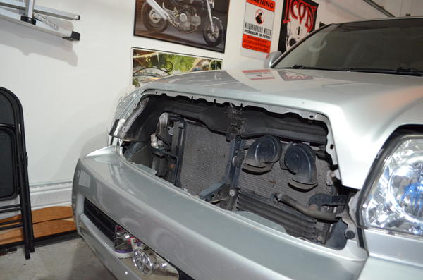 1st step, get the grille off the car