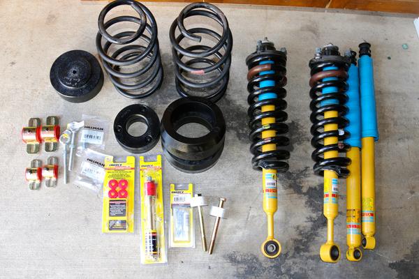 2014  Taco swap with fj rear springs, front budget boost spacer, 2 inch driver side rear/ 1.5 passenger spacer and customish end links. Poly sway bar 