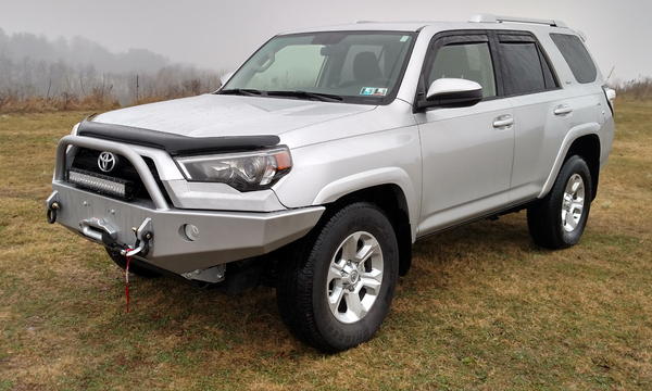2015 SR5 4Runner with a ShrockWorks front bumper with Warn Zeon 10-S Platinum Winch and Rough Country 20" LED Light Bar.