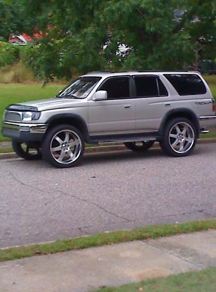 24" custom color matched rims
black jdm heads and corners
top and bottom flush mounted and custom cut billet grille
murdered windows custom TRD exhaus
