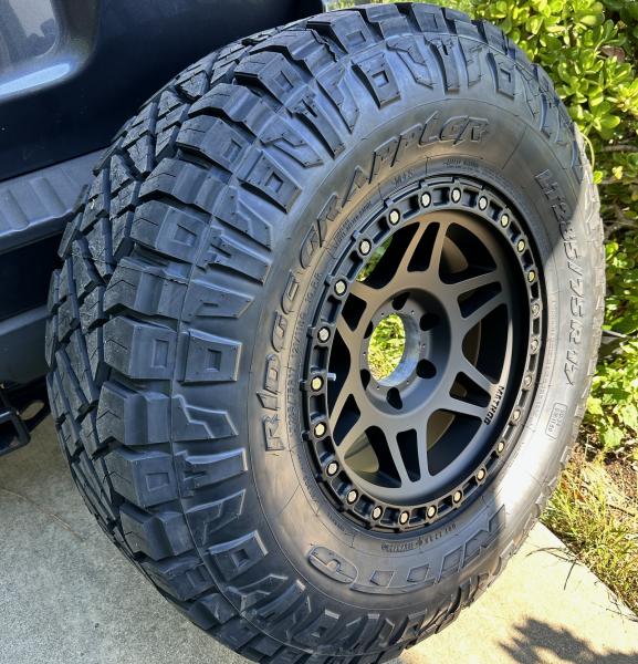 285/75-17R, 34" Perfect fit.