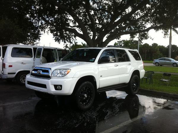3 inch revtek lift, 20 inch black xd hoss wheels wrapped in nitto terra grapplers