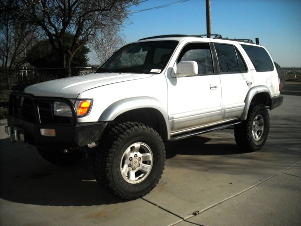 315s....need a small body lift to stop the rubbin.