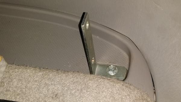 4 x 4 x 3/4 wide shelf angle from Lowes

I cut one leg to 1-1/2" to fit where the tie down hook mounts.