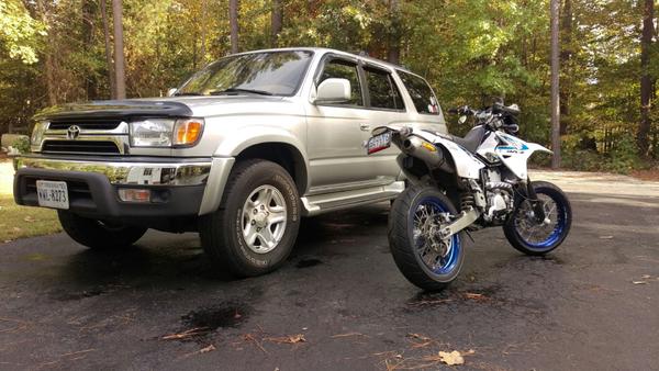 4Runner and DRZ400SM.

Stock tires (265/70r16) and no lift