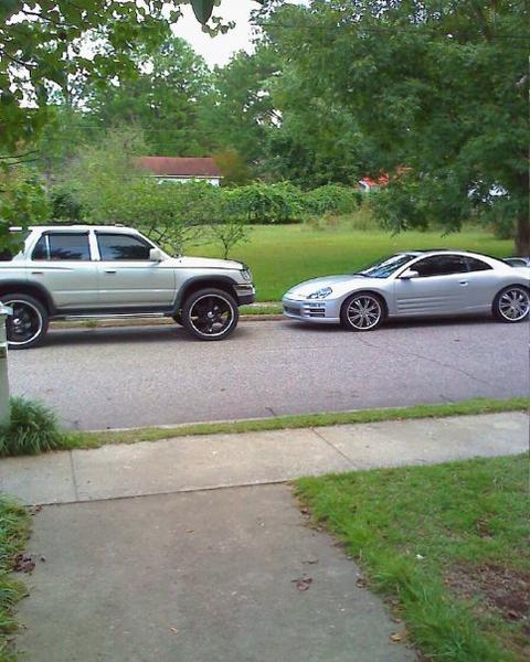 4runner black 24's with my 3g eclipse lowered with 20's