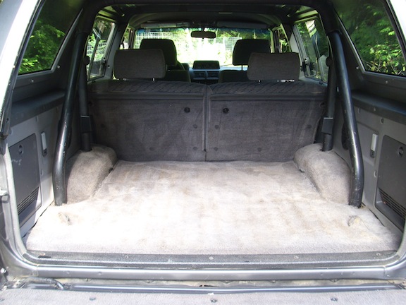 4Runner Cargo Area been well used but in good shape for all the use I have Gotten out of it.I have added the padded toyota cover on the top of the Rol
