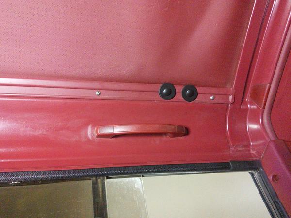 5/16" x 3" carriage bolts with 3/8" x  1-1/2" fender washer then 3/8" x 1-1/2" neoprene washer on inside. Filled holes with clear rtv silicone, put bo