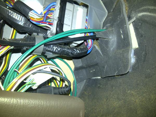 5 cable connections: green wires(top right) come from sensor, 4 conductor wire (just see it on the left side)... also in pic, inline fuse (just behind