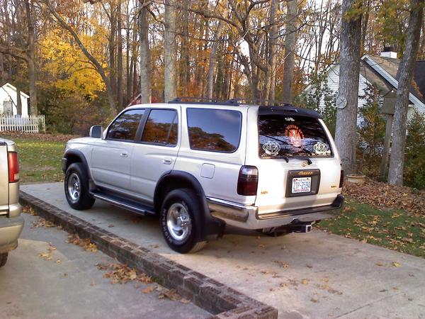 5% tint on the front windows and 5% over 20% rest of the way around, smoked tail lights with blue reverse bulb covers