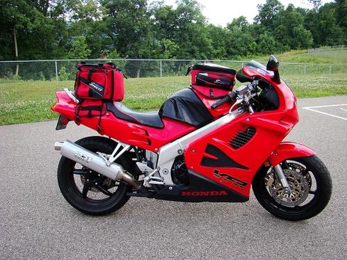 '97 Honda VFR750--great all-around bike, with racer looks but a reasonable seating position (hence the bags, for longer rides).  V4 engine had power e