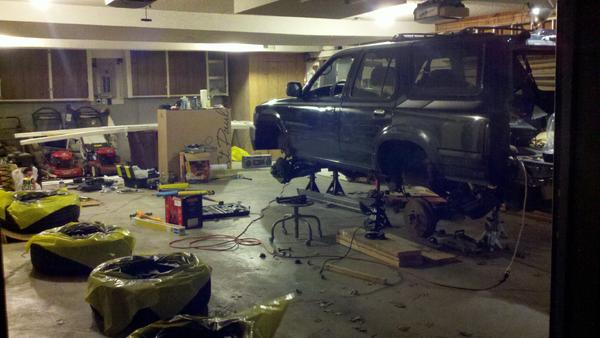 A lot going on. Coil install, shock install, steering stabilizer install, plasti-dip SR5 rims, and touching up some other things.