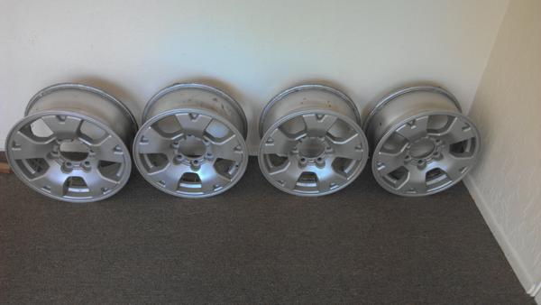 A set of Tacoma sport wheels that I stripped and re-finished with the intention of installing them on my '97 4runner.