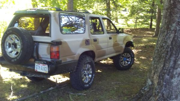 Added spare tire carrier to the rear.