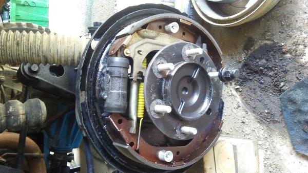 addressing the rear brakes, New seals, Bearings, Shoes & hardware kit