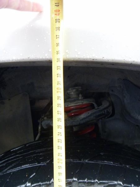 After front. Measured from top of rim.