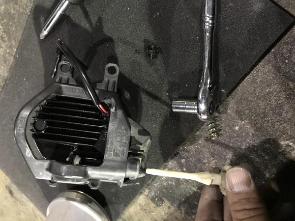 After placing the OEM mounting bracket, place back the plastic screw that used for the alignment of the fog lights.