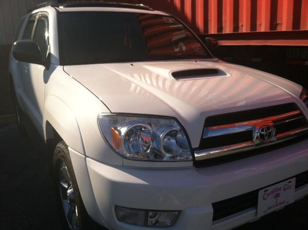 After the wreck with the new headlights and Sport hood.