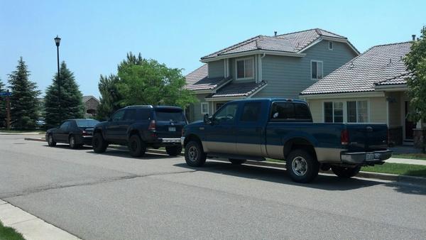 All 3 of our vehicles in a row.