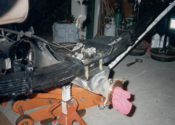 AllPro long travel rear suspension with flipped U-bolts.