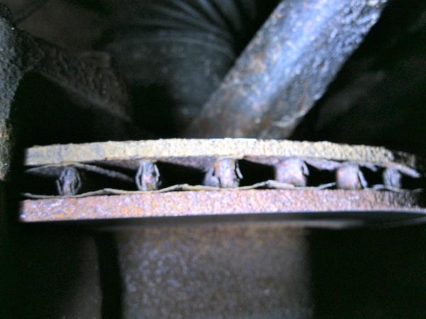 Another closeup of the old rotor (drivers side), which was pulling quite a bit to the left.