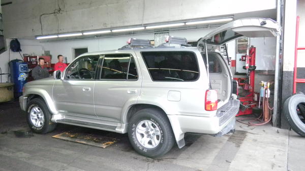 At Big O Tires waiting for my 2007 FJ 17 inch Wheels to be mounted on. Angled view.