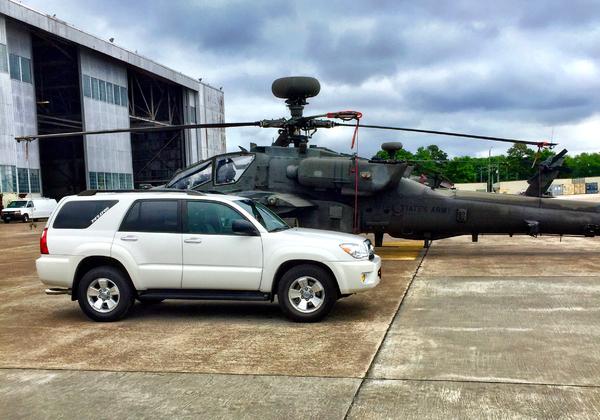 At work T4R next to the AH-64D Apache Longbow
