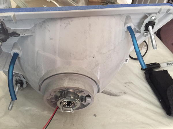 Attaching breather tubes (Petsmart fish tank air lines) with cheesecloth filters (Michael's / Target).