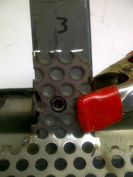 attachment of screen to grille frame