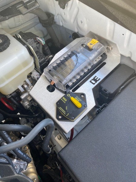 AuxPower bank from Blue Sea Systems on a frame from Overland Equipped.