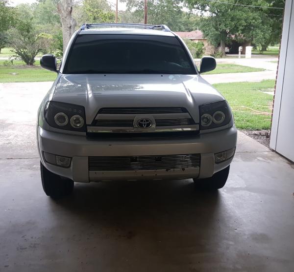 Before I plasti dipped the front end.  I had just added three piece billet grille with projector style headlights.