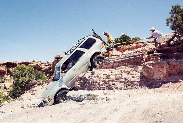 Behind the Rocks trail near Moab Utah. The obstacle is White Knuckle Hill. The guy standing at my rear bumper was my spotter. It was standard to put a