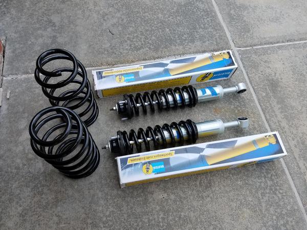 Bilstein 6112 and 5160 shocks, with Wheeler T13 rear springs.