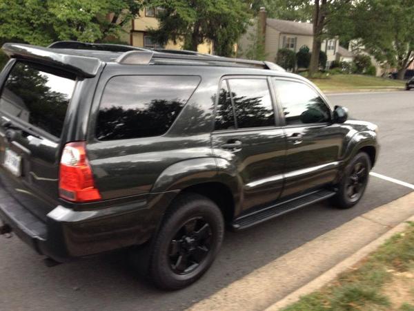 Blacked out chrome, de-badged, and painted wheels.
