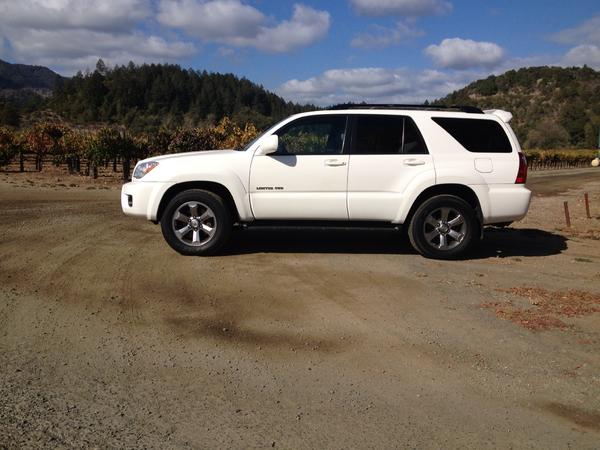 Bone stock, factory: nav, tint, power everything, sunroof, dhac, trac control, center lockers, tow package.  Your average run of the mill limited. The