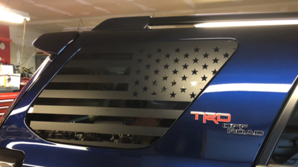 Both rear side window decaled