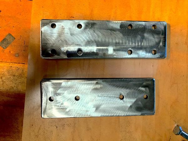 Brackets I made to raise the awning above the lift gate.