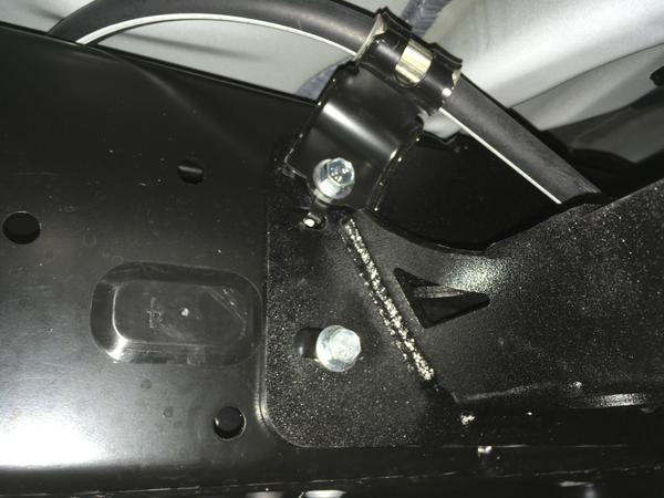 Brake tab at rear plate.