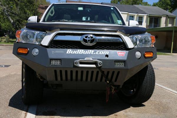 Budbuilt front bumper (new Feb 2012), Warn M8000, mounted in bumper synthetic winch (new Dec 2013).  Two Rigid, 6" LED lights mounted in bumper.
