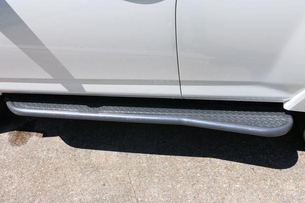 Budbuilt sliders with bumpouts, powder-coated grey, matching front bumper.  Note, I still have original rocker panels from new, they are free to buyer