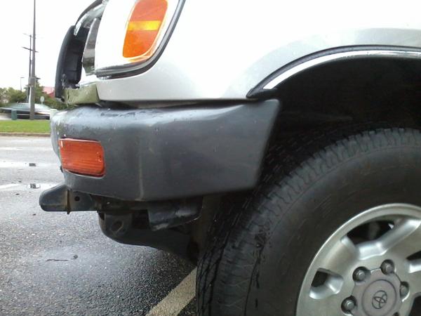 Bumper pushed back. Turn signal plastic cracked.