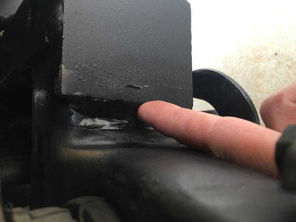 Bumper stitch welds to frame