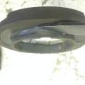 bushing rim that needs to be cut off one of the bushings in order to fit up against