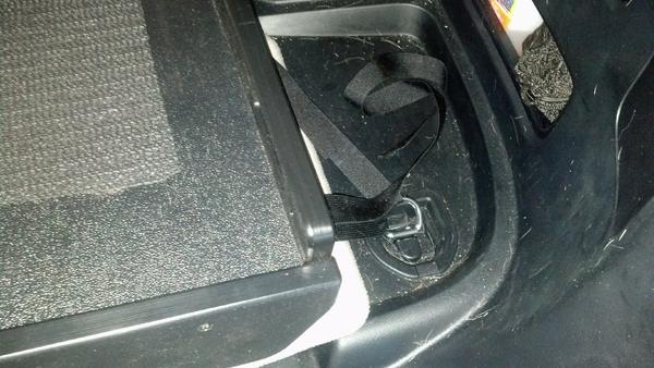 cargo slide side attachment- the rear attachment just hooks into the hooks behind the rear seats.
